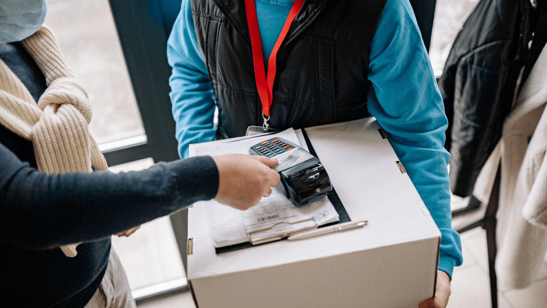 Recipient signing for a door-to-door international courier delivery